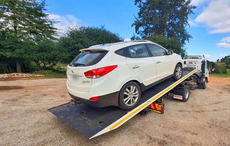 Our Isuzu rollback loading a customer's car in Tzaneen